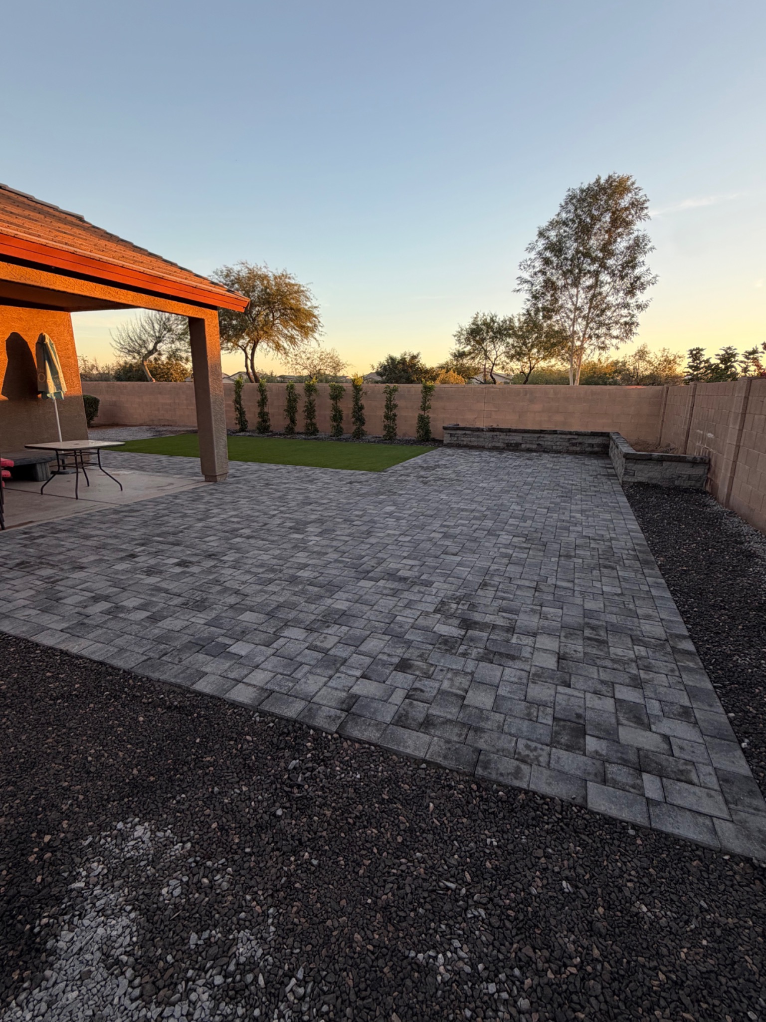 Backyard after turf and paver renovation