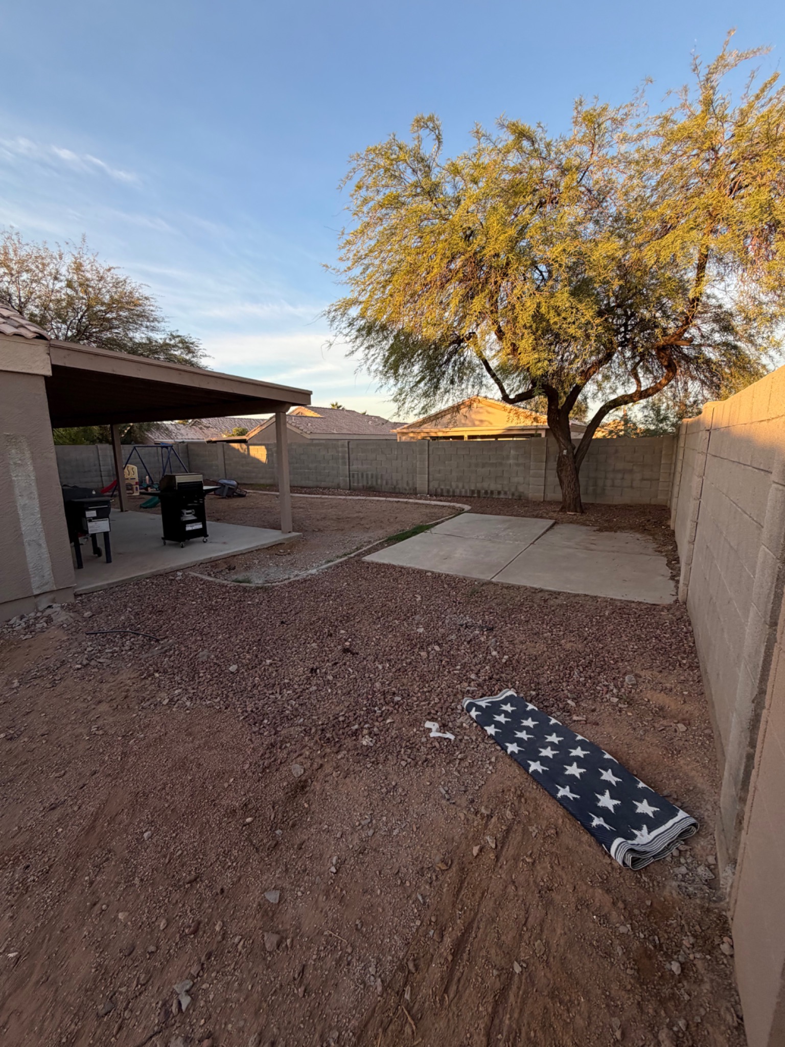 Bare Arizona backyard before landscape installation