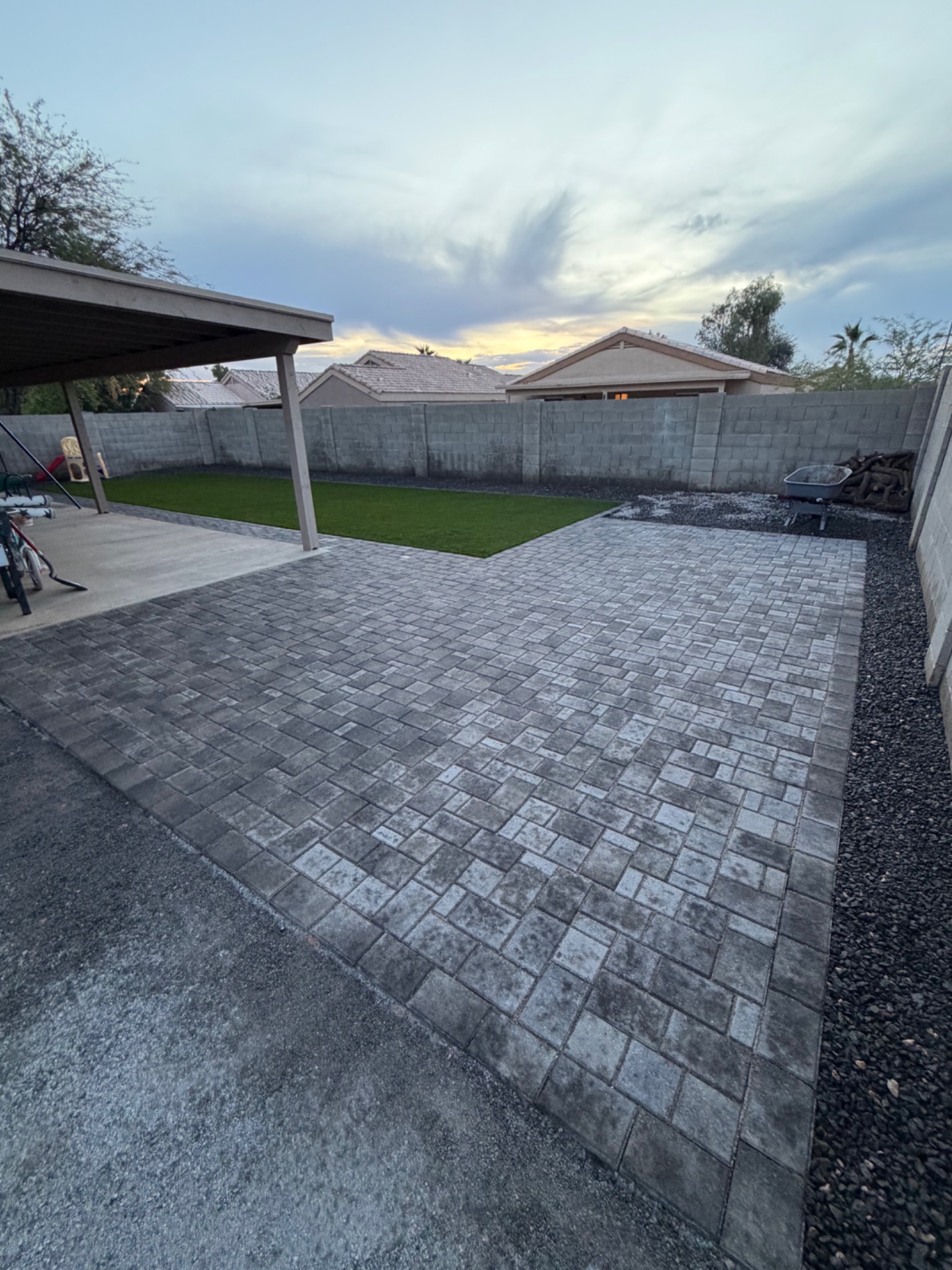 Arizona backyard after paver and turf installation