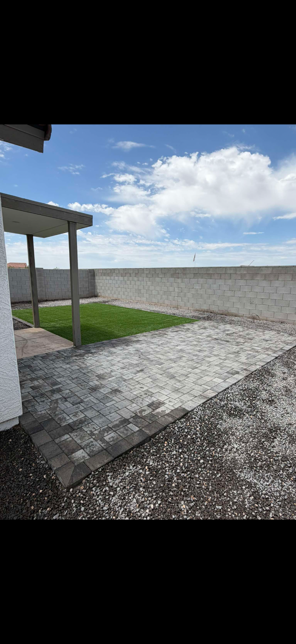 Paver patio and turf backyard installation in Arizona